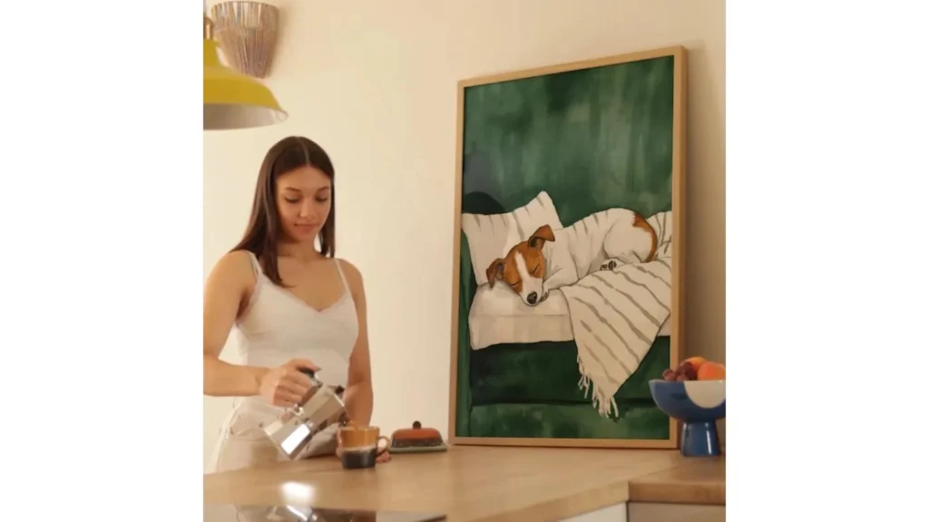 Girl & Coffee Frame Mockup- a girl pouring coffee beside a frame with a canvas of sleeping dog