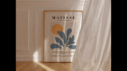 Thin Vertical Wooden Wall Art Frame Mockup- a wooden frame that has a canvas if sun and plant with a background of plain wall and a curtain swaying in the wind