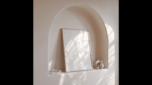 Wall Art Thin Frame Mockup a frame that is leaning on the wall with a vase and scented candle beside the frame